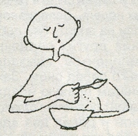 Человек ест ложкой из тарелки.
